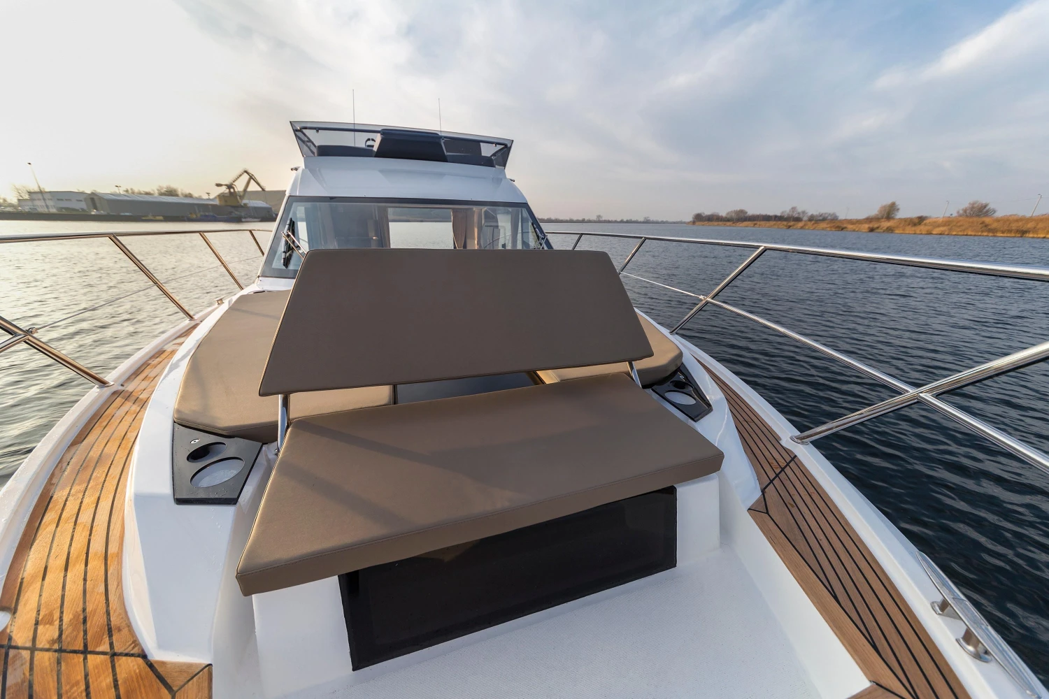 2025 Galeon 360 Fly yacht with sleek deck design on calm water.