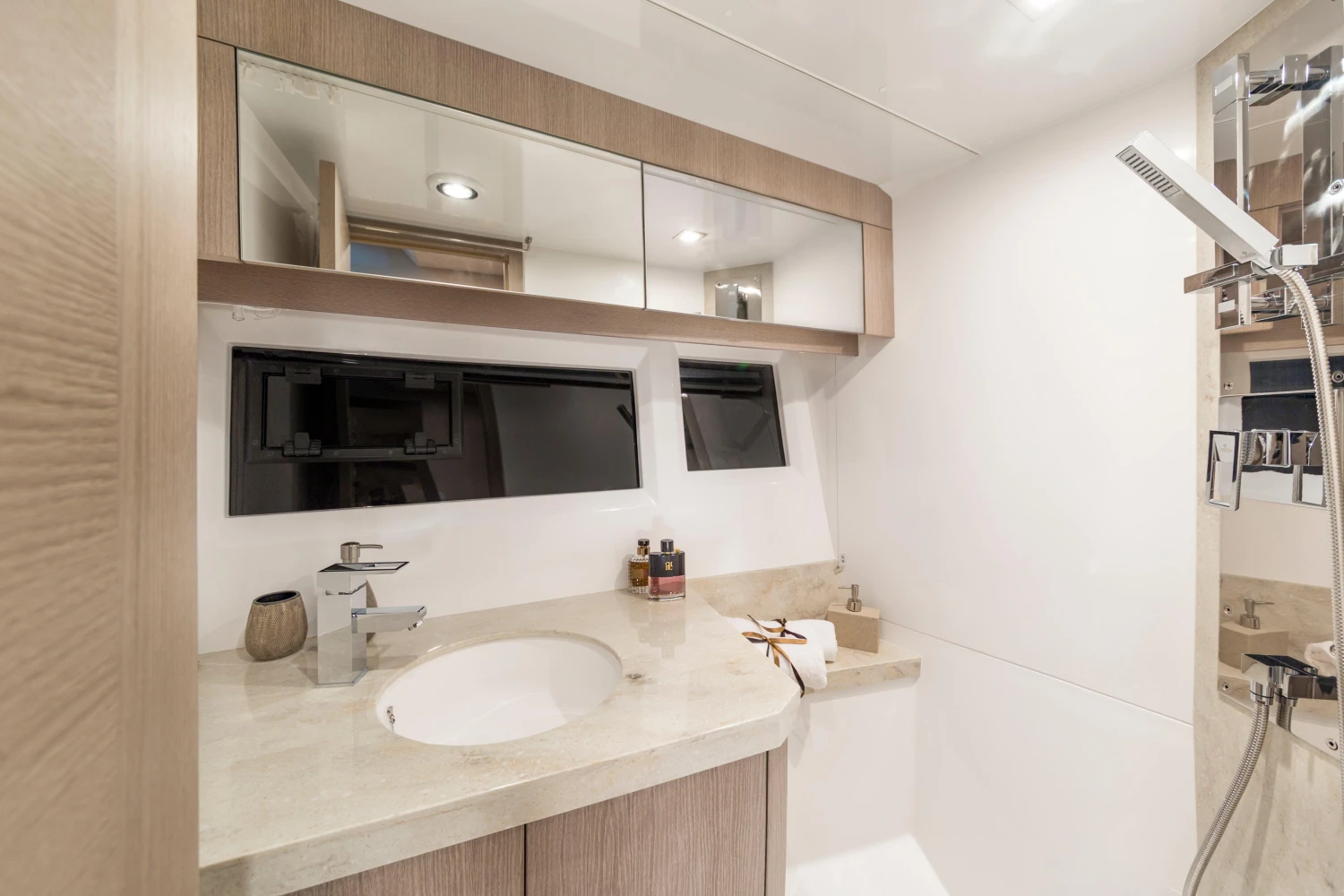 Luxurious bathroom interior of 2025 Galeon 360 Fly yacht with modern fixtures.