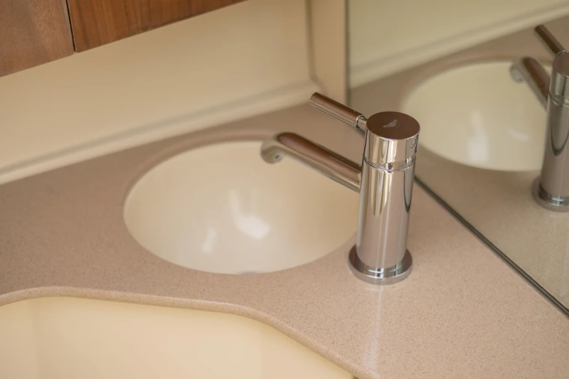 Modern sink and faucet in 2013 Chris-Craft Launch 32 boat bathroom.