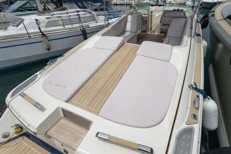2013 Chris-Craft Launch 32 boat with spacious seating and elegant design docked at marina.