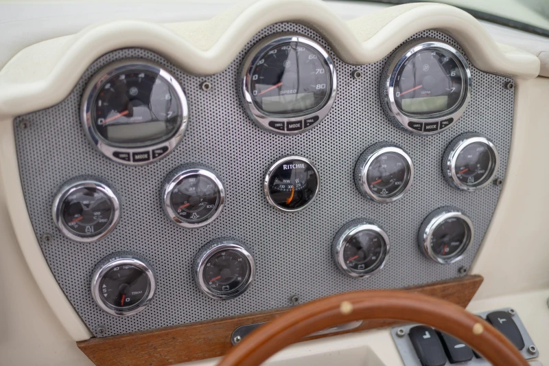 Dashboard of 2013 Chris-Craft Launch 32 boat with gauges and controls.