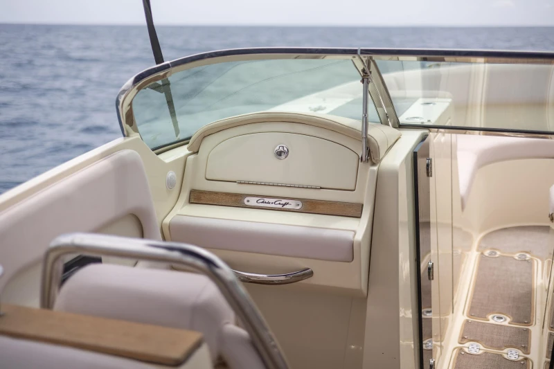 2013 Chris-Craft Launch 32 boat interior with elegant dashboard and ocean view.