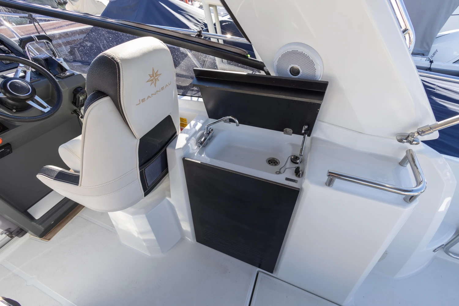 Helm and sink area on 2018 Jeanneau Leader 30 boat.