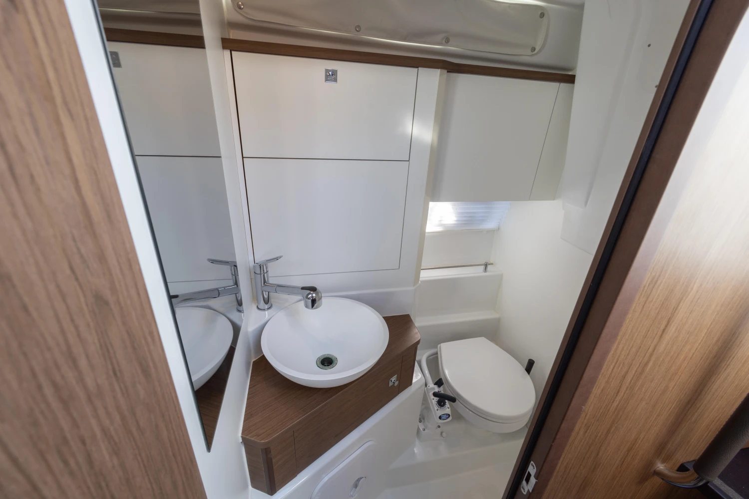 2018 Jeanneau Leader 30 bathroom with modern sink and toilet.