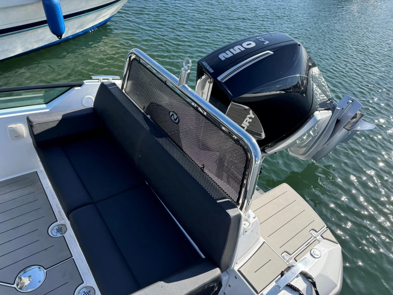 2023 Nordkapp Enduro 705 boat with outboard motor, featuring sleek seating and modern design.