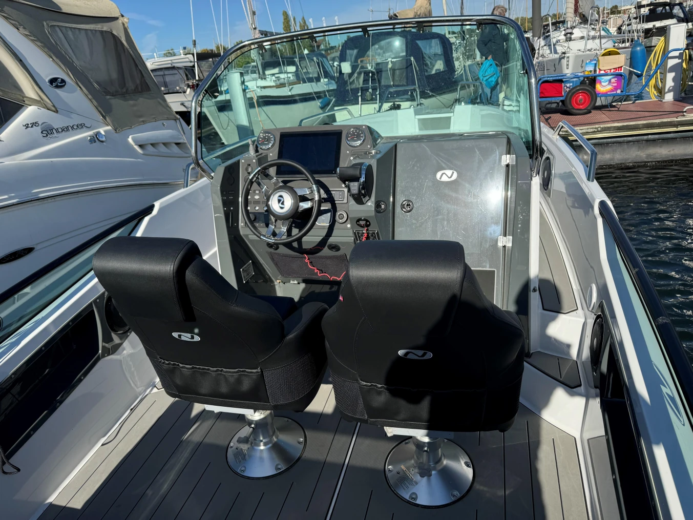 2023 Nordkapp Enduro 705 boat interior with dual seats and modern dashboard.