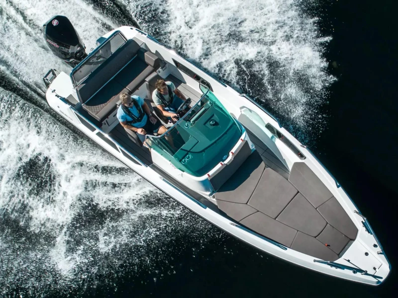 2023 Nordkapp Enduro 705 boat cruising on water, aerial view.