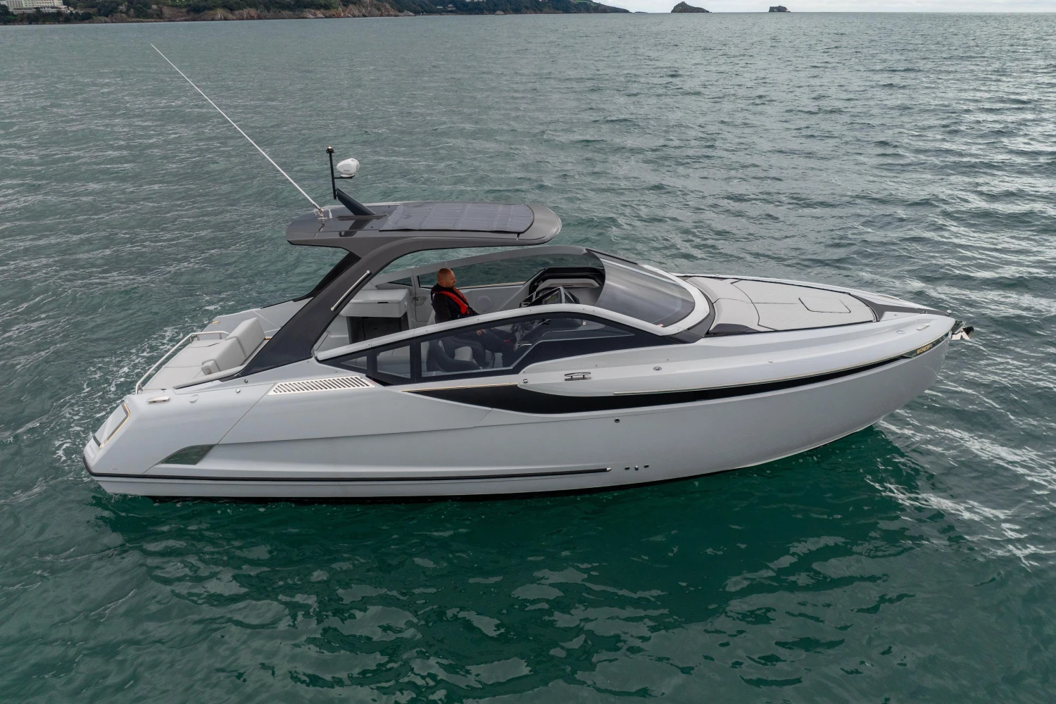 2023 Fairline F//Line 33 luxury yacht cruising on open water.