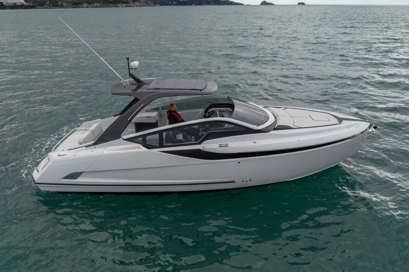 2023 Fairline F//Line 33 luxury yacht cruising on open water.