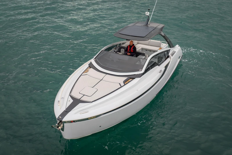 2023 Fairline F//Line 33 luxury yacht cruising on open water.