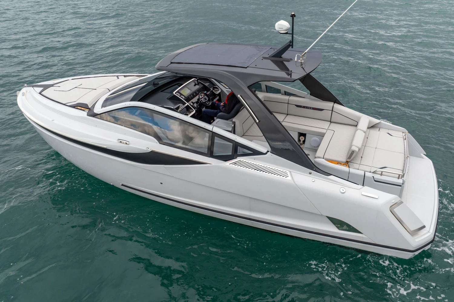 2023 Fairline F//Line 33 luxury yacht cruising on open water.