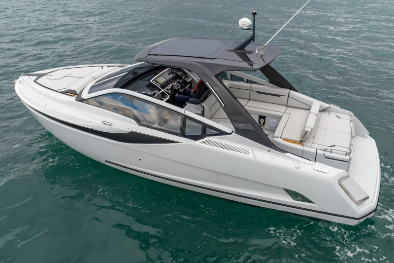 2023 Fairline F//Line 33 luxury yacht cruising on open water.