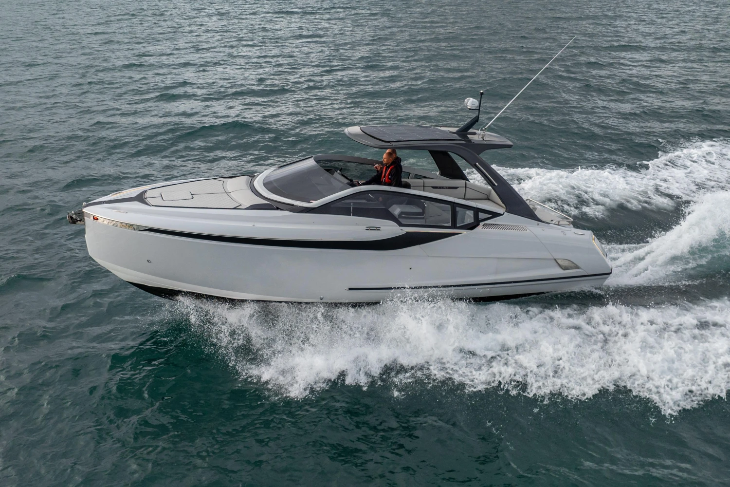 2023 Fairline F//Line 33 yacht cruising on open water.