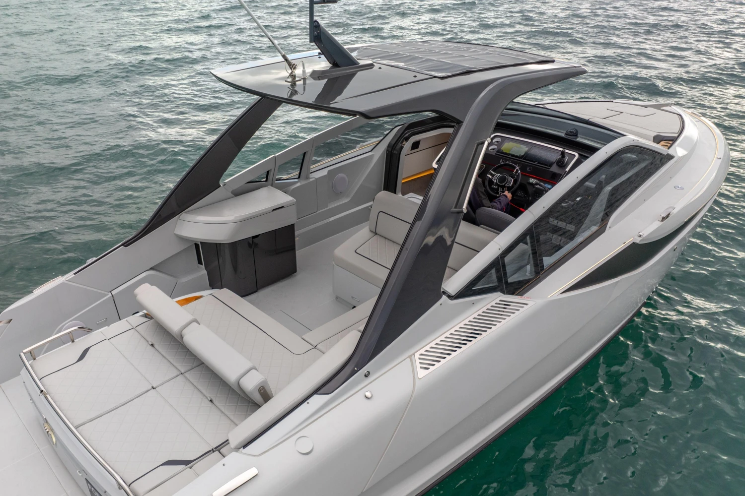 2023 Fairline F//Line 33 luxury yacht on water, showcasing sleek design and spacious deck.