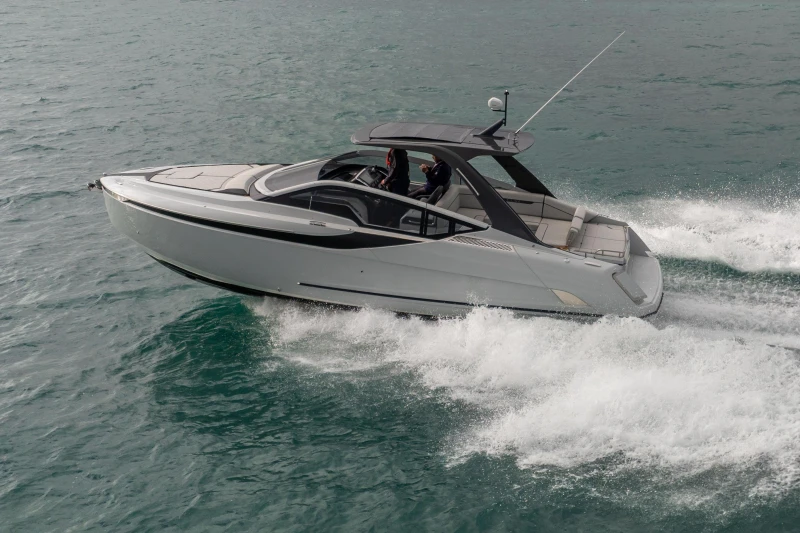 2023 Fairline F//Line 33 luxury yacht cruising on open water.