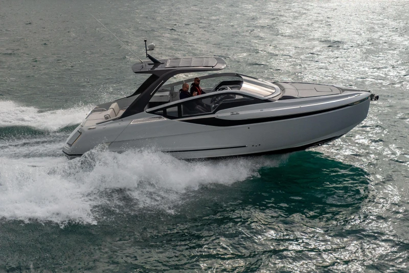 2023 Fairline F//Line 33 yacht cruising on open water.