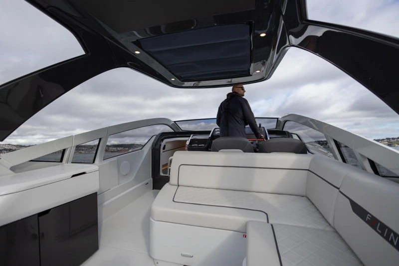 2023 Fairline F//Line 33 luxury yacht interior with modern seating and sleek design.