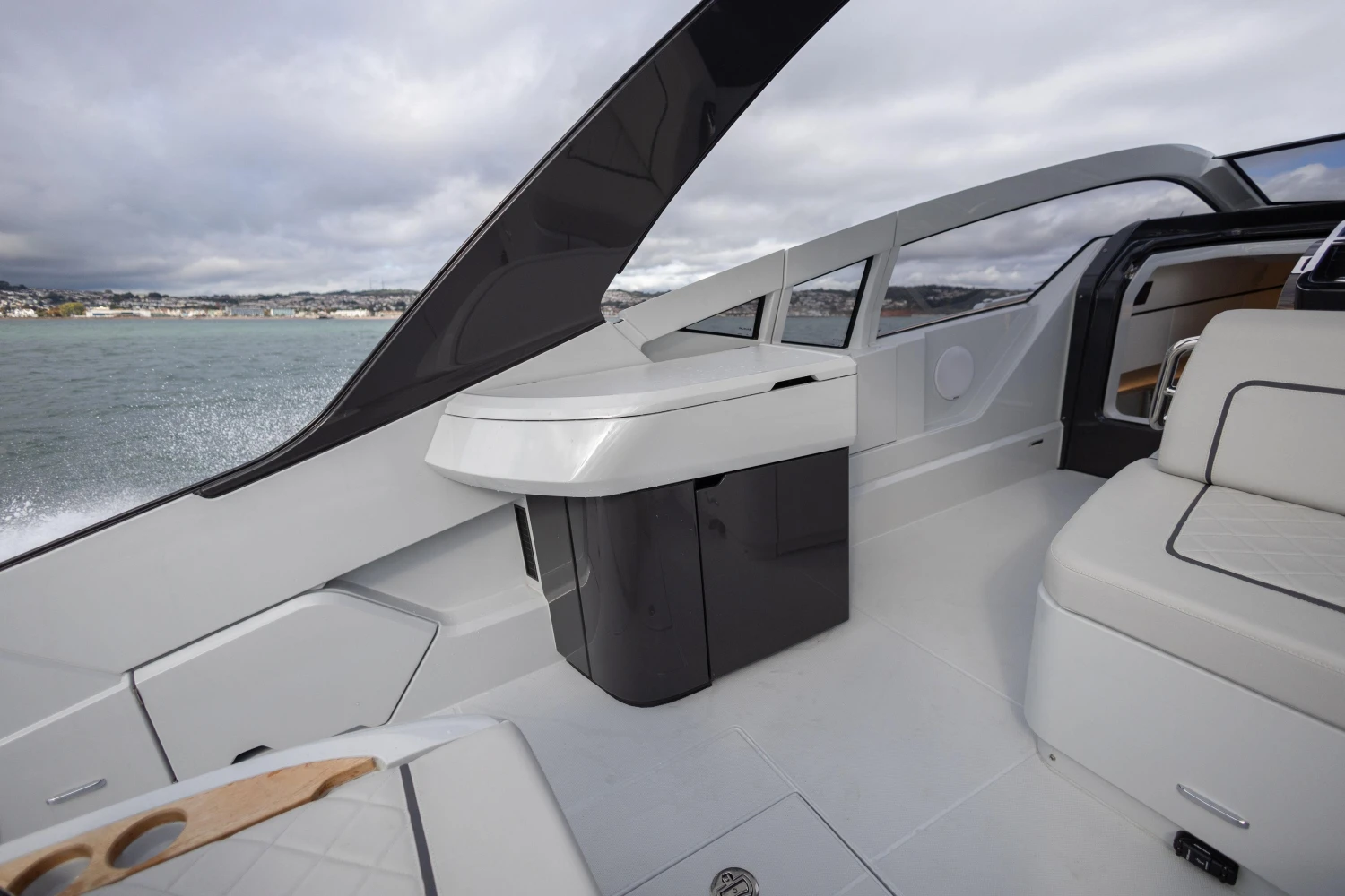 2023 Fairline F//Line 33 yacht interior with sleek design and modern seating.