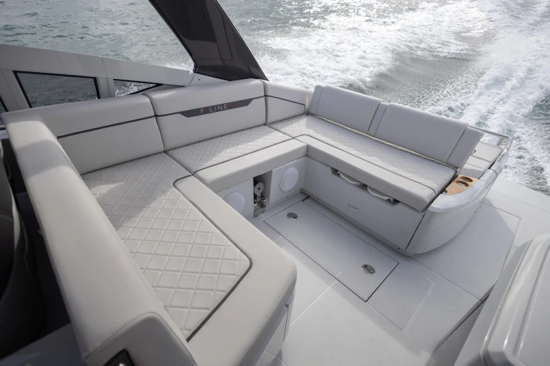 2023 Fairline F//Line 33 yacht interior with luxurious seating and sleek design.