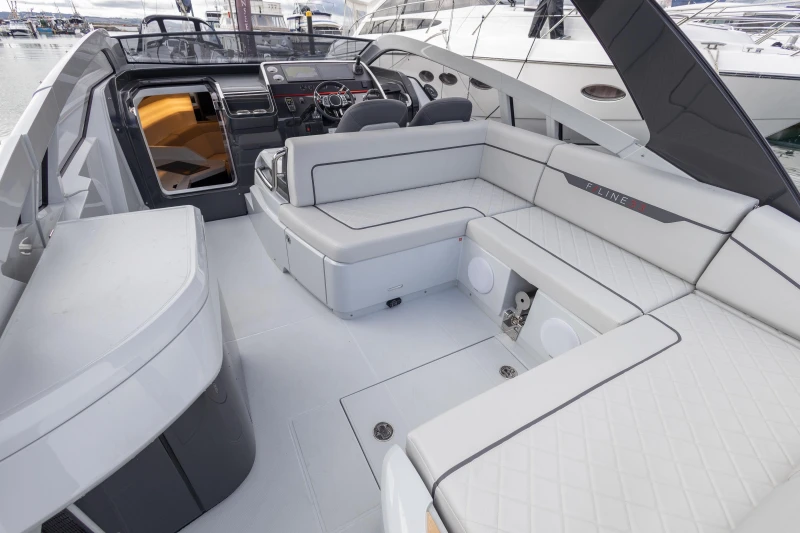 2023 Fairline F//Line 33 yacht interior with luxurious seating and modern design.