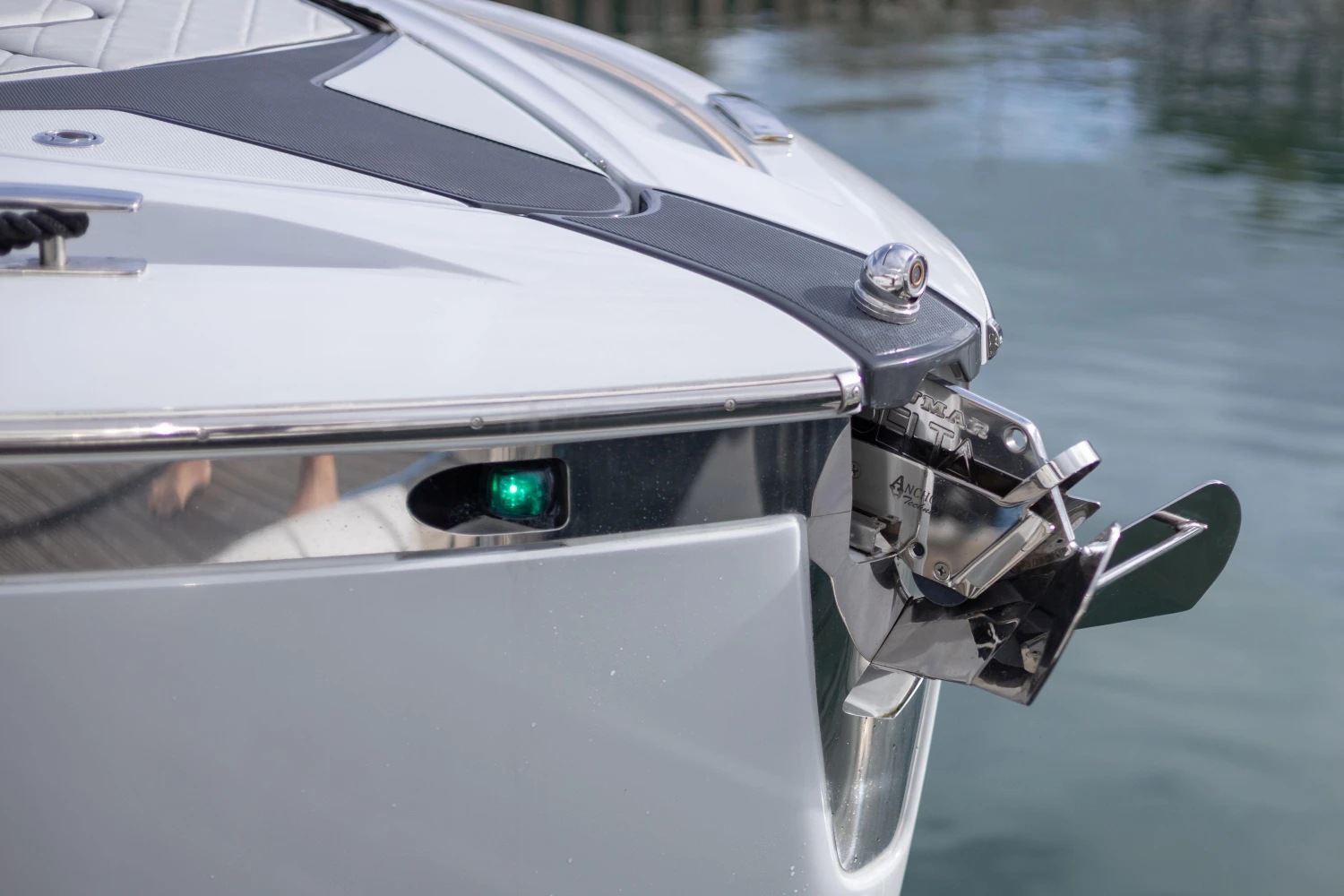 2023 Fairline F//Line 33 yacht bow with anchor and navigation light.